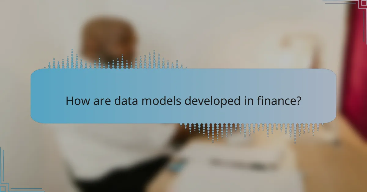 How are data models developed in finance?